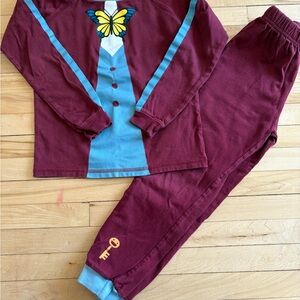 Playful Red and Blue Pajama Sets with Character Design